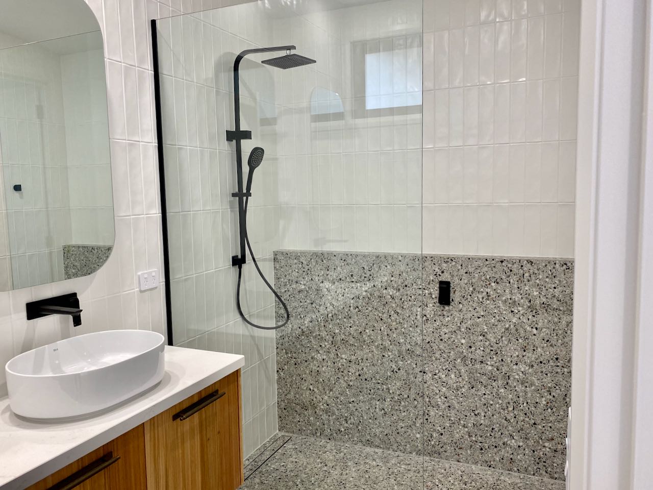 Coastal bathroom with terrazzo tiles